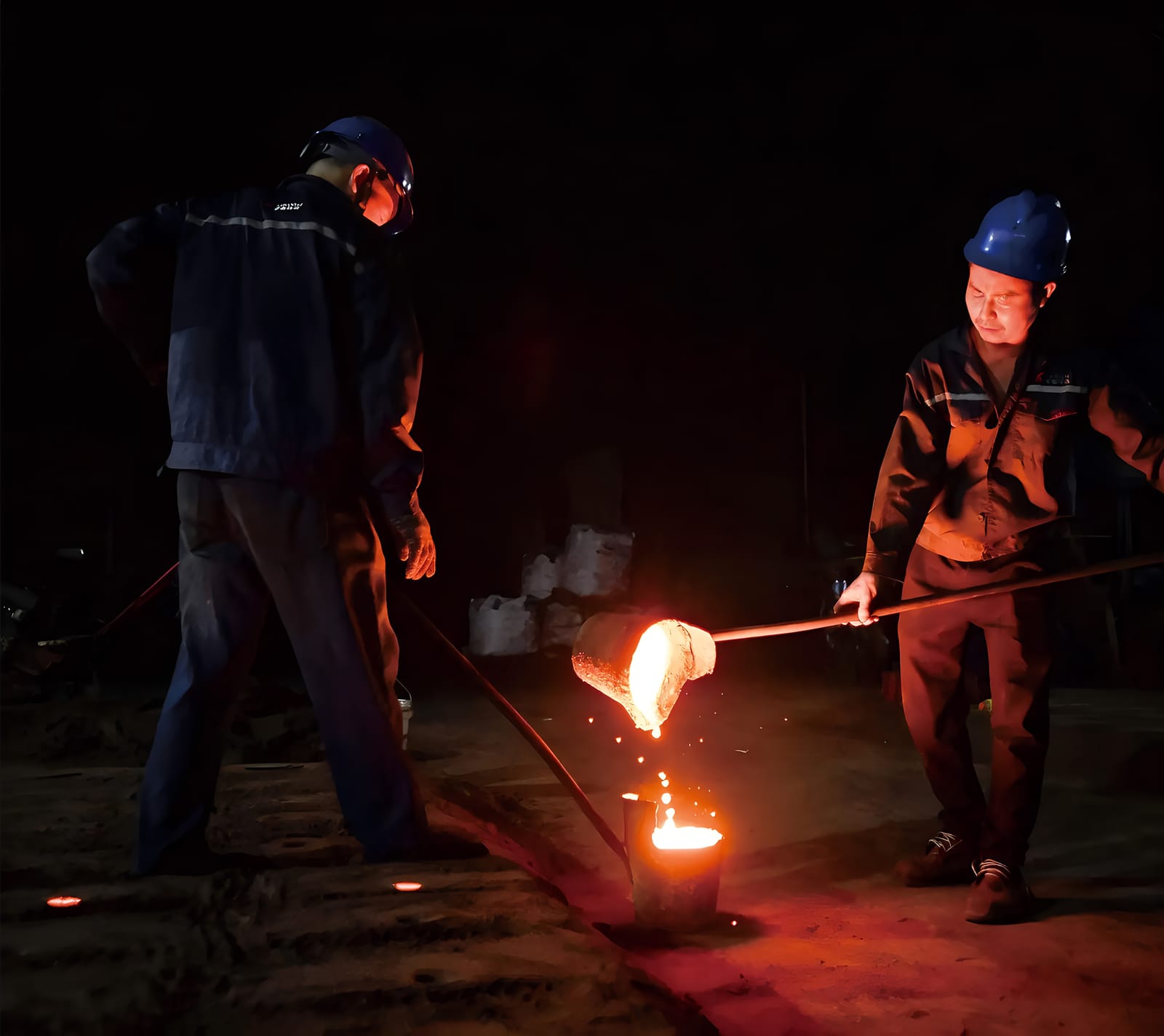 Foundry production scene cast iron cookware factory photo